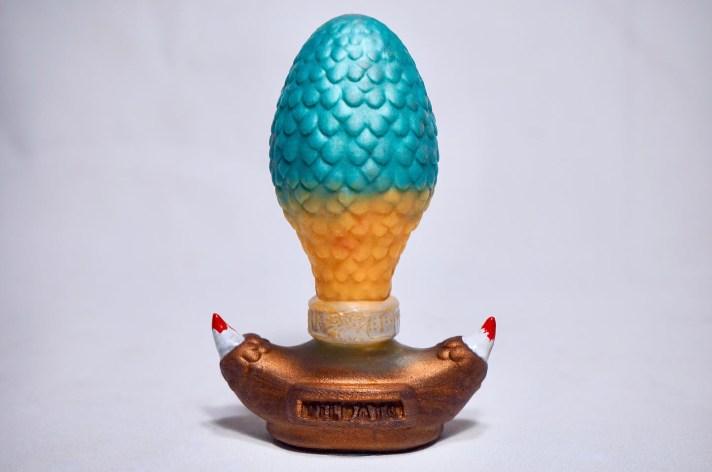 Huevo de Dragón Ass-Irius - Azul Coral, Amarillo y Cobre.