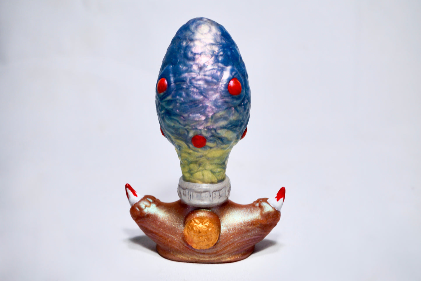 Huevo de dragón Ass-Irius - Azul, verde y cobre