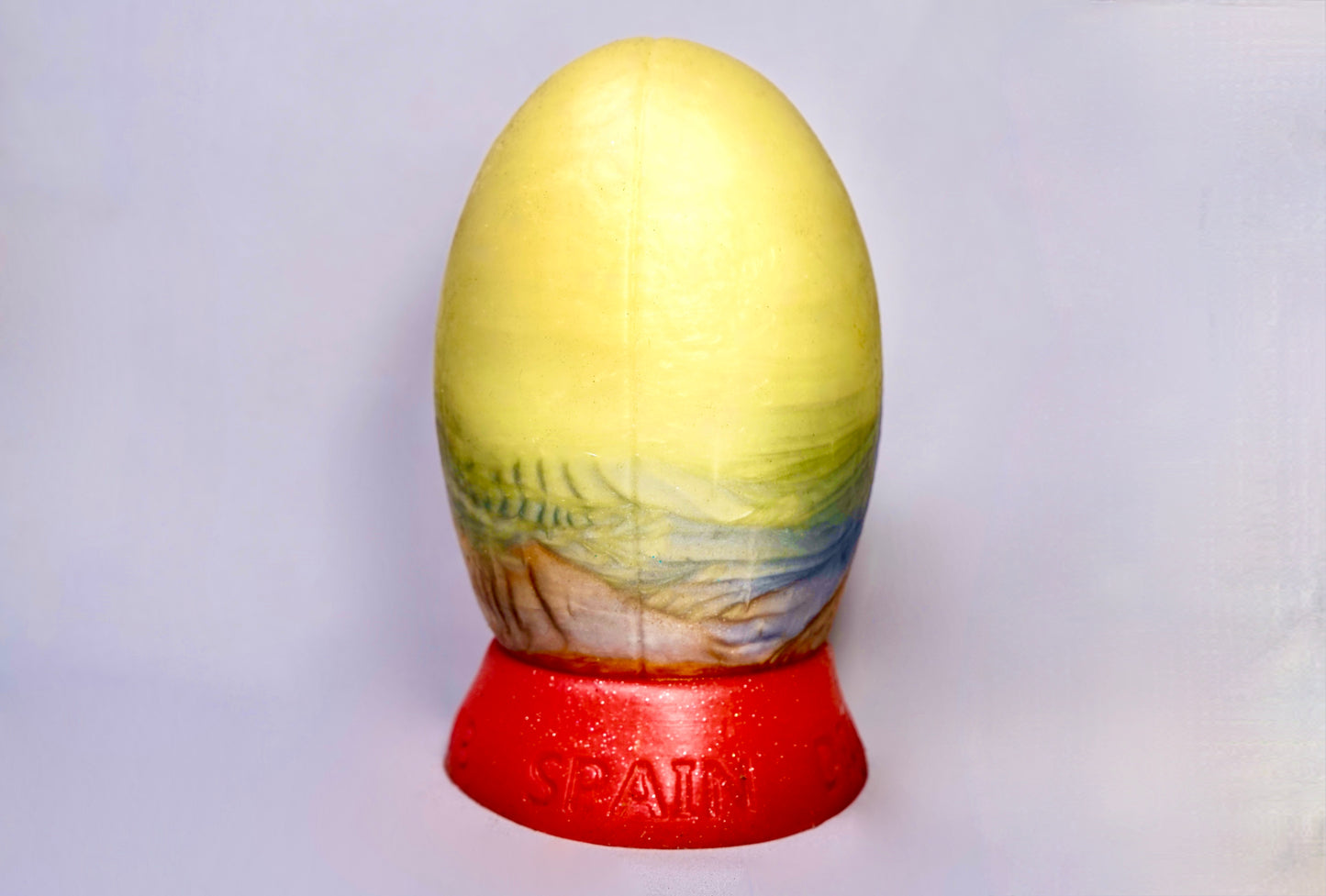 The Heavy Trundle Rugby Ball - Size Medium, Gold, Silver and Bronze, with a red base.