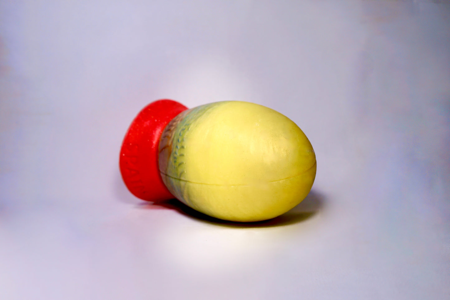 The Heavy Trundle Rugby Ball - Size Medium, Gold, Silver and Bronze, with a red base.